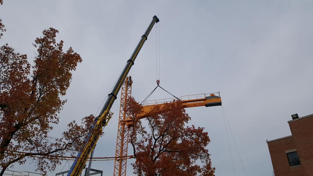 275 crane assembling tower crane in Clayton, MO